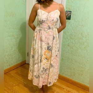 Brand new dress with tag attached. Beautiful summer dress. Material linen